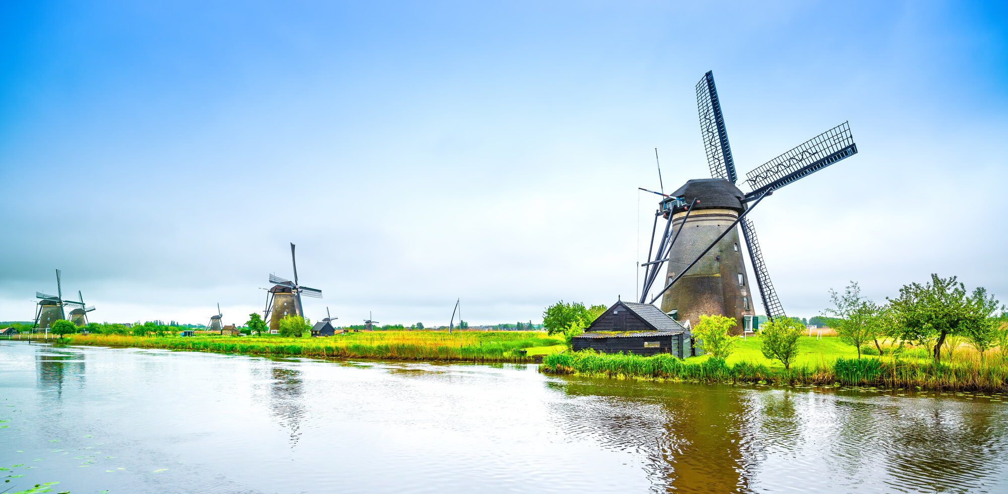 Windmills and canal in Kinderdijk, Holland or Netherlands. Unesco site